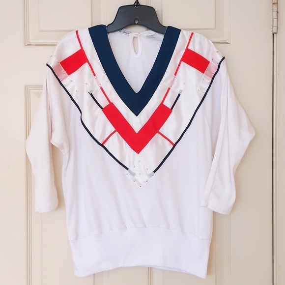 NWOT. Woman's V-Neck knit top with design and decorations. - Picture 2 of 3